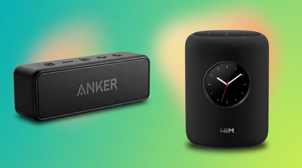 Anker portable Bluetooth speaker and black digital alarm clock on a gradient background